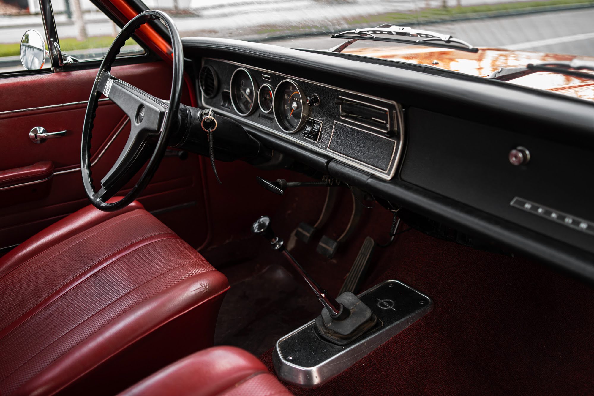 Red Opel Rekord 1969 rear angle