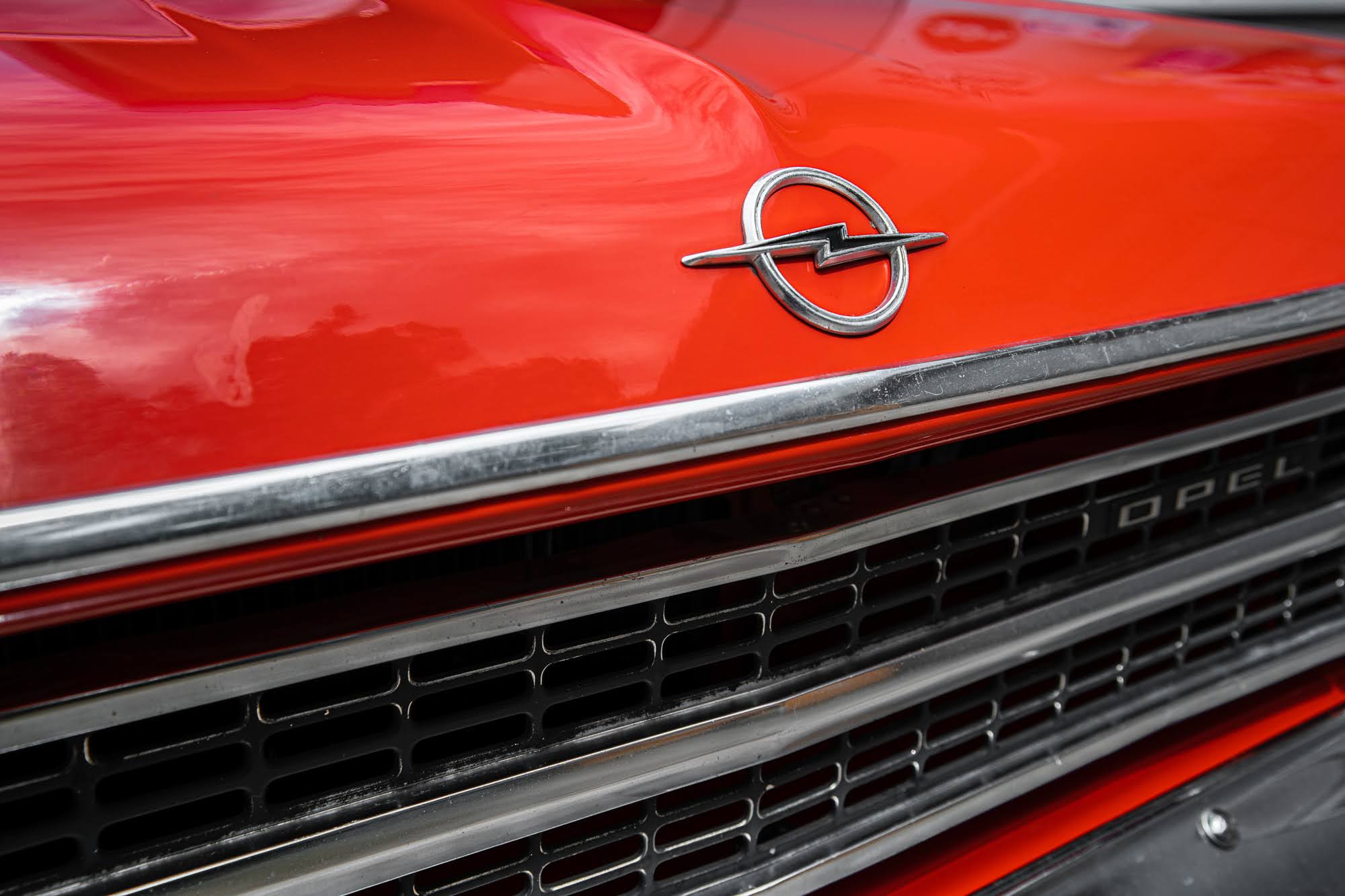 Red Opel Rekord 1969 exterior detail